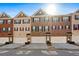 Row of townhouses with attached garages at 2397 Foley Park St, Snellville, GA 30078