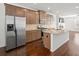 Spacious kitchen featuring stainless steel appliances and granite island at 2397 Foley Park St, Snellville, GA 30078