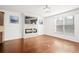 Living room with hardwood floors and fireplace at 2397 Foley Park St, Snellville, GA 30078