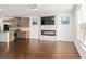 Living room with hardwood floors and fireplace at 2397 Foley Park St, Snellville, GA 30078