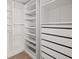 Large walk-in closet with shelving and drawers at 2397 Foley Park St, Snellville, GA 30078