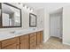 Elegant bathroom with double vanity and large mirrors at 686 Westmoreland Ln, Lawrenceville, GA 30043