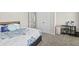 Spacious bedroom with king-size bed and private access to closet at 686 Westmoreland Ln, Lawrenceville, GA 30043