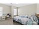 Bright bedroom with a king-size bed and plenty of natural light at 686 Westmoreland Ln, Lawrenceville, GA 30043