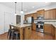 Modern kitchen with stainless steel appliances and granite countertops at 686 Westmoreland Ln, Lawrenceville, GA 30043