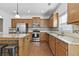 Updated kitchen featuring stainless steel appliances and granite countertops at 686 Westmoreland Ln, Lawrenceville, GA 30043