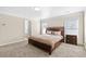 Main bedroom with king-size bed, ensuite access and large windows at 686 Westmoreland Ln, Lawrenceville, GA 30043