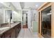 Luxurious bathroom with double vanity, walk-in shower, and sauna at 3280 Stillhouse Se Ln # 410, Atlanta, GA 30339
