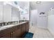 Double vanity bathroom with granite countertop at 3280 Stillhouse Se Ln # 410, Atlanta, GA 30339