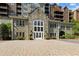 Luxury condo building with inviting stone entryway at 3280 Stillhouse Se Ln # 410, Atlanta, GA 30339