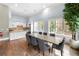 Bright community kitchen and dining area with hardwood floors at 3280 Stillhouse Se Ln # 410, Atlanta, GA 30339