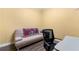 Small home office with a comfortable sofa and workspace at 3280 Stillhouse Se Ln # 410, Atlanta, GA 30339