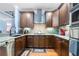 Modern kitchen with stainless steel appliances and granite countertops at 3280 Stillhouse Se Ln # 410, Atlanta, GA 30339