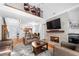 Spacious living room with fireplace and hardwood floors at 3280 Stillhouse Se Ln # 410, Atlanta, GA 30339