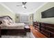 Spacious bedroom with hardwood floors and large windows at 3280 Stillhouse Se Ln # 410, Atlanta, GA 30339