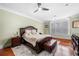 Spacious bedroom with hardwood floors and large windows at 3280 Stillhouse Se Ln # 410, Atlanta, GA 30339