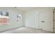 Neutral bedroom features plush carpeting and natural light from two windows at 4322 Timberland Sw Dr, Lilburn, GA 30047