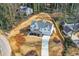 Beautiful new construction home boasts neutral paint and a welcoming front entrance and driveway at 4322 Timberland Sw Dr, Lilburn, GA 30047