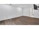Bright bedroom with wood flooring and access to bathroom at 24214 Plantation Ne Dr, Atlanta, GA 30324
