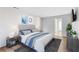 Bright bedroom with wood flooring and access to a private bath at 24214 Plantation Ne Dr, Atlanta, GA 30324