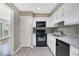 Updated kitchen, white cabinets, gray backsplash at 24214 Plantation Ne Dr, Atlanta, GA 30324