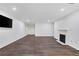 Bright living room with hardwood floors and fireplace at 24214 Plantation Ne Dr, Atlanta, GA 30324