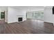 Living room with hardwood floors and fireplace at 24214 Plantation Ne Dr, Atlanta, GA 30324