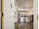 Open concept entryway with polished concrete floors and barn doors at 3648 Peachtree Ne Rd # 3A, Atlanta, GA 30319