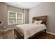 Cozy bedroom with hardwood floors and a large window at 2741 Prado Ln, Marietta, GA 30066
