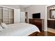Comfortable bedroom with a built-in TV and ensuite bathroom at 2741 Prado Ln, Marietta, GA 30066