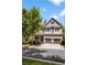 Two-story house with gray siding, brown accents, and a three-car garage at 2741 Prado Ln, Marietta, GA 30066