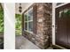 Charming front porch with stone facade and dark brown door at 2741 Prado Ln, Marietta, GA 30066