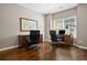 Bright home office features hardwood floors, built-in desk, and ample natural light at 2741 Prado Ln, Marietta, GA 30066