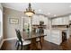 Kitchen with breakfast area and white cabinets at 2741 Prado Ln, Marietta, GA 30066