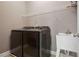 Convenient laundry room with washer, dryer, and utility sink at 2741 Prado Ln, Marietta, GA 30066