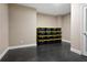Ample storage space in the basement with numerous storage bins at 2741 Prado Ln, Marietta, GA 30066
