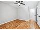 Bright bedroom with hardwood floors and ceiling fan at 124 Cagle Way, Hiram, GA 30141