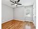 Well-lit bedroom with hardwood floors and neutral walls at 124 Cagle Way, Hiram, GA 30141