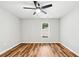 Spacious bedroom with wood-look floors and ceiling fan at 124 Cagle Way, Hiram, GA 30141