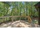 Deck with cable railing and view of trees at 124 Cagle Way, Hiram, GA 30141