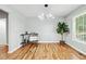 Bright dining room with hardwood floors and large window at 124 Cagle Way, Hiram, GA 30141