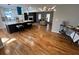 Modern kitchen with island, white cabinets, and teal range hood at 124 Cagle Way, Hiram, GA 30141