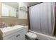 Clean bathroom with a shower/tub combo and white vanity at 300 W Peachtree Ne St # 8E, Atlanta, GA 30308