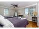 Comfortable bedroom with two twin beds and hardwood floors at 300 W Peachtree Ne St # 8E, Atlanta, GA 30308