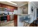 Modern kitchen with breakfast bar and stylish barstools at 300 W Peachtree Ne St # 8E, Atlanta, GA 30308