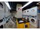 Large laundry facility with numerous machines at 300 W Peachtree Ne St # 8E, Atlanta, GA 30308