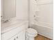 Bathroom with single vanity, bathtub, and shower at 7083 Brushwood Bend (Lot 52), Lithonia, GA 30058