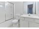 Clean bathroom with a shower/tub combo and white vanity at 3335 Briaroak Dr, Duluth, GA 30096