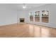 Living room featuring hardwood floors and a fireplace at 3335 Briaroak Dr, Duluth, GA 30096