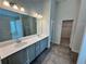 Double vanity bathroom with large mirror and separate shower at 3964 Riverchess Lot 157 Dr, Atlanta, GA 30331